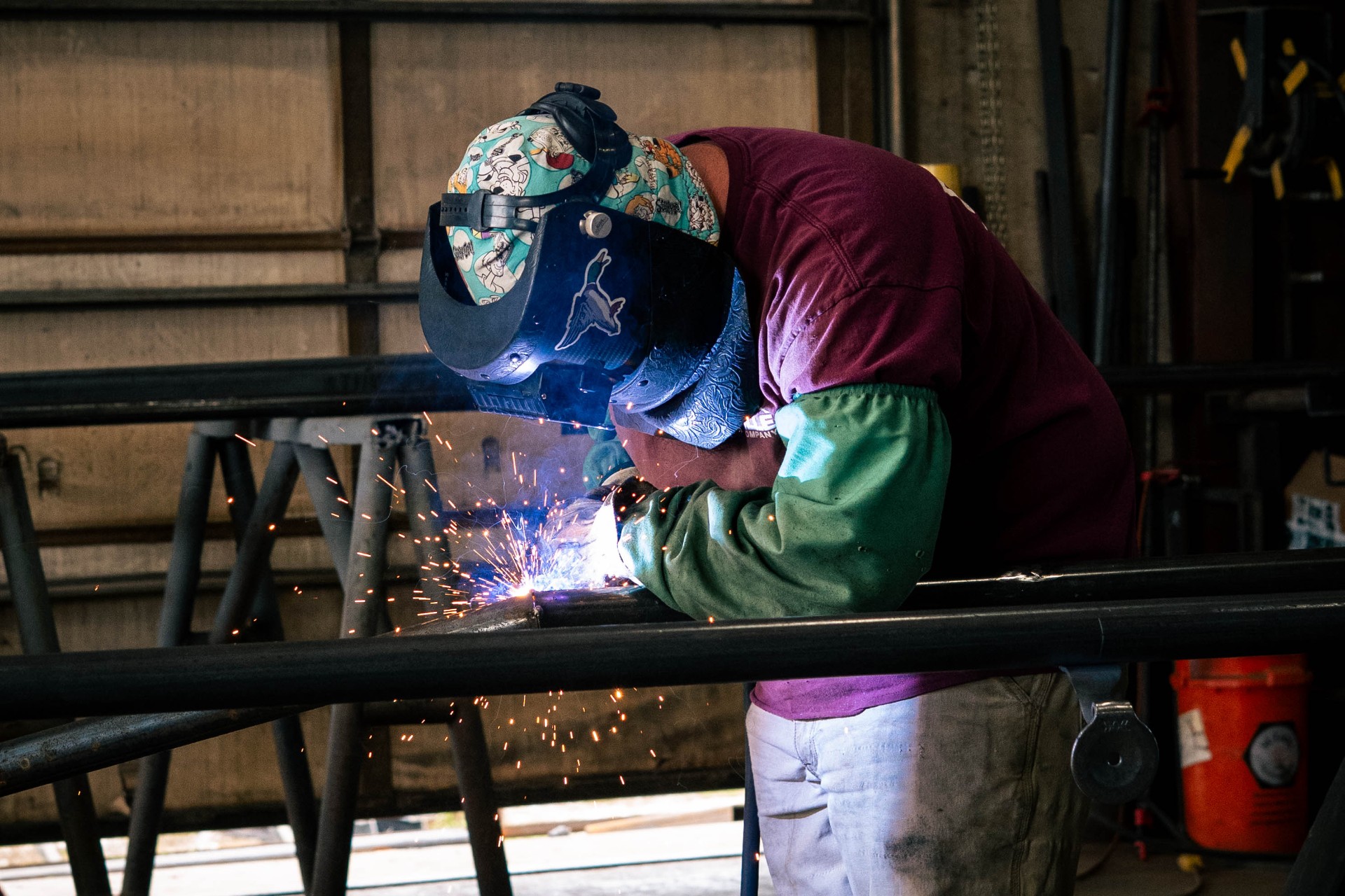 Welder joining steel tubing